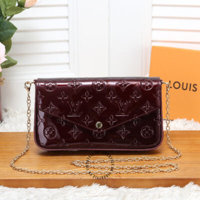 ví cầm tay nữ louis vuitton