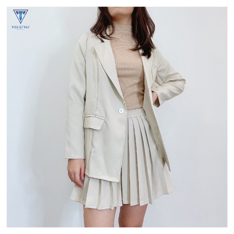 Áo blazer phối cùng chân váy xếp ly